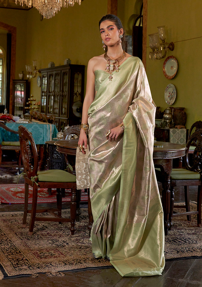 Light green Kanjivaram silk blend woven saree with traditional motifs