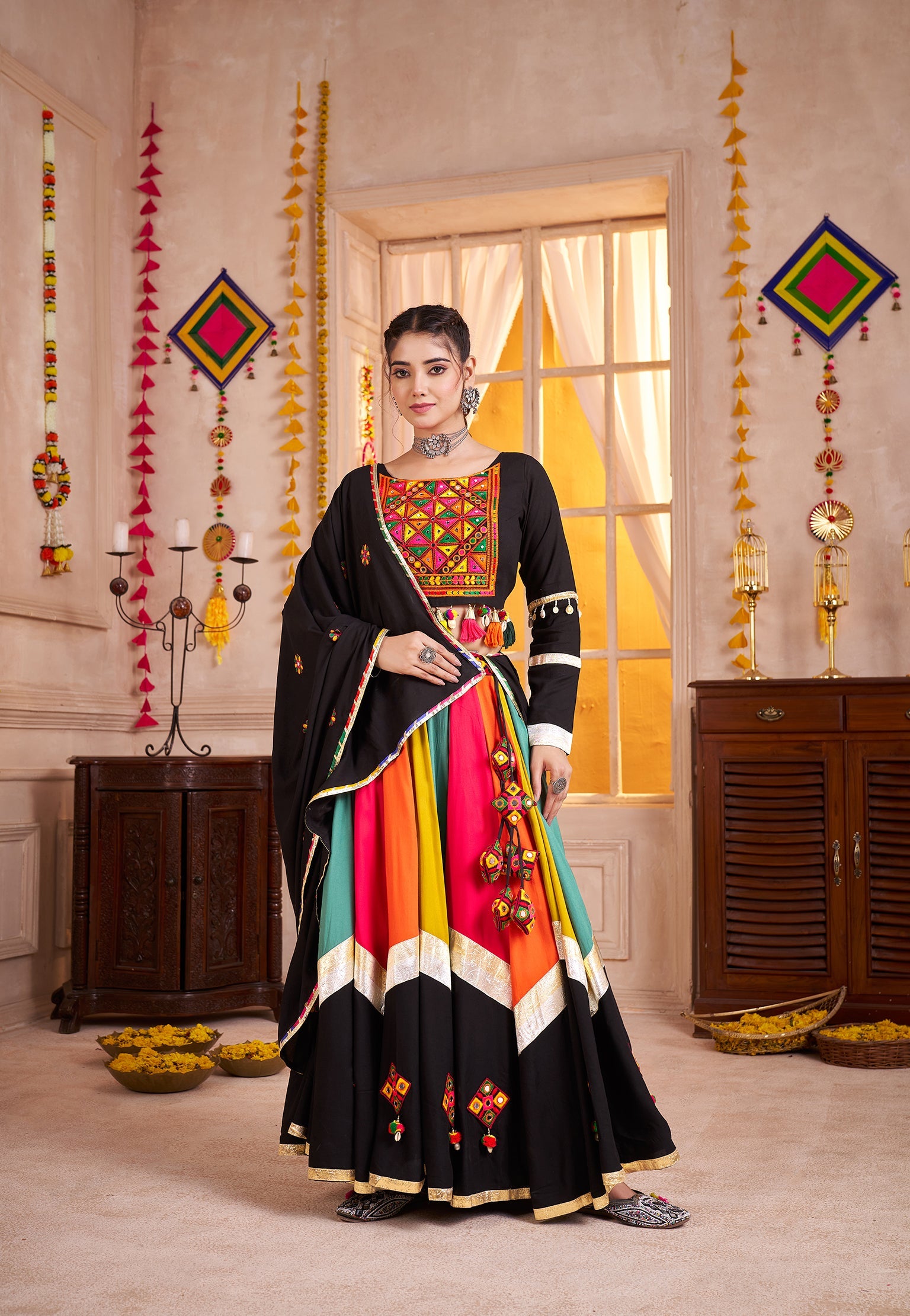 Black viscose cotton lehenga choli with intricate thread and mirror work for Navratri