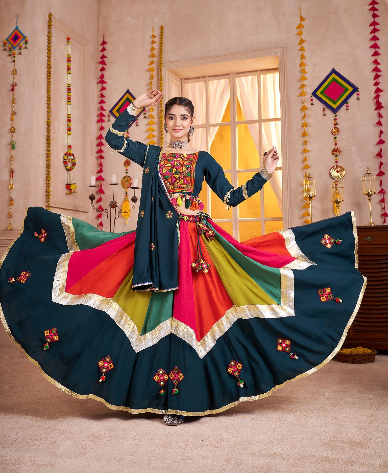 Teal Blue Navratri Lehenga Choli with mirror work and Kutchi embroidery