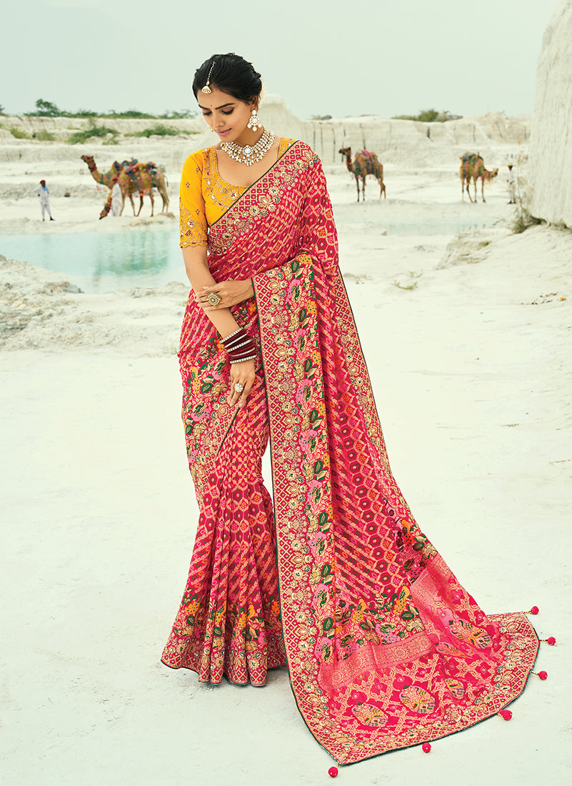 Rani pink georgette bandhej saree with zari and bead embroidery