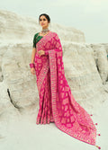Rani pink designer georgette saree with Bandhej pattern and zari work