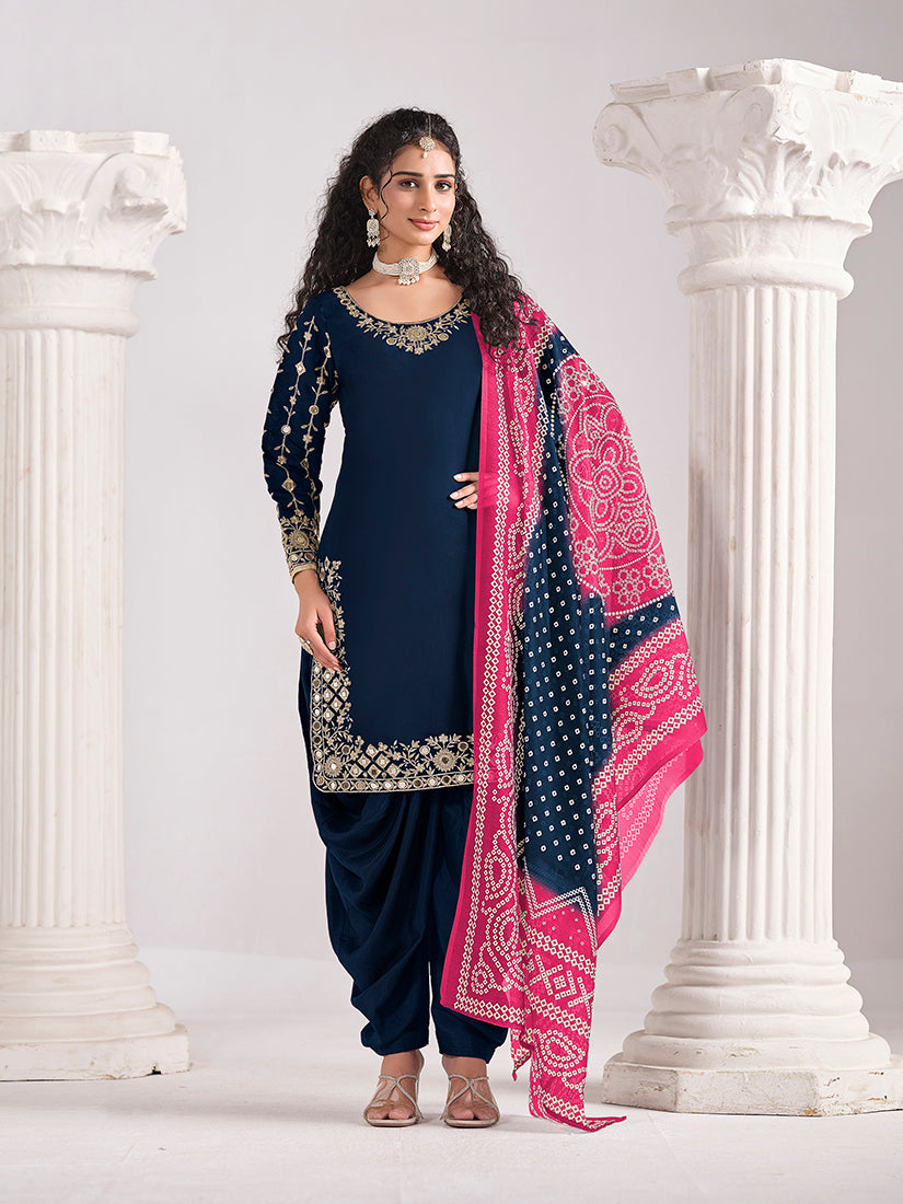 Navy blue Chanderi silk salwar kameez with detailed embroidery and mirror work