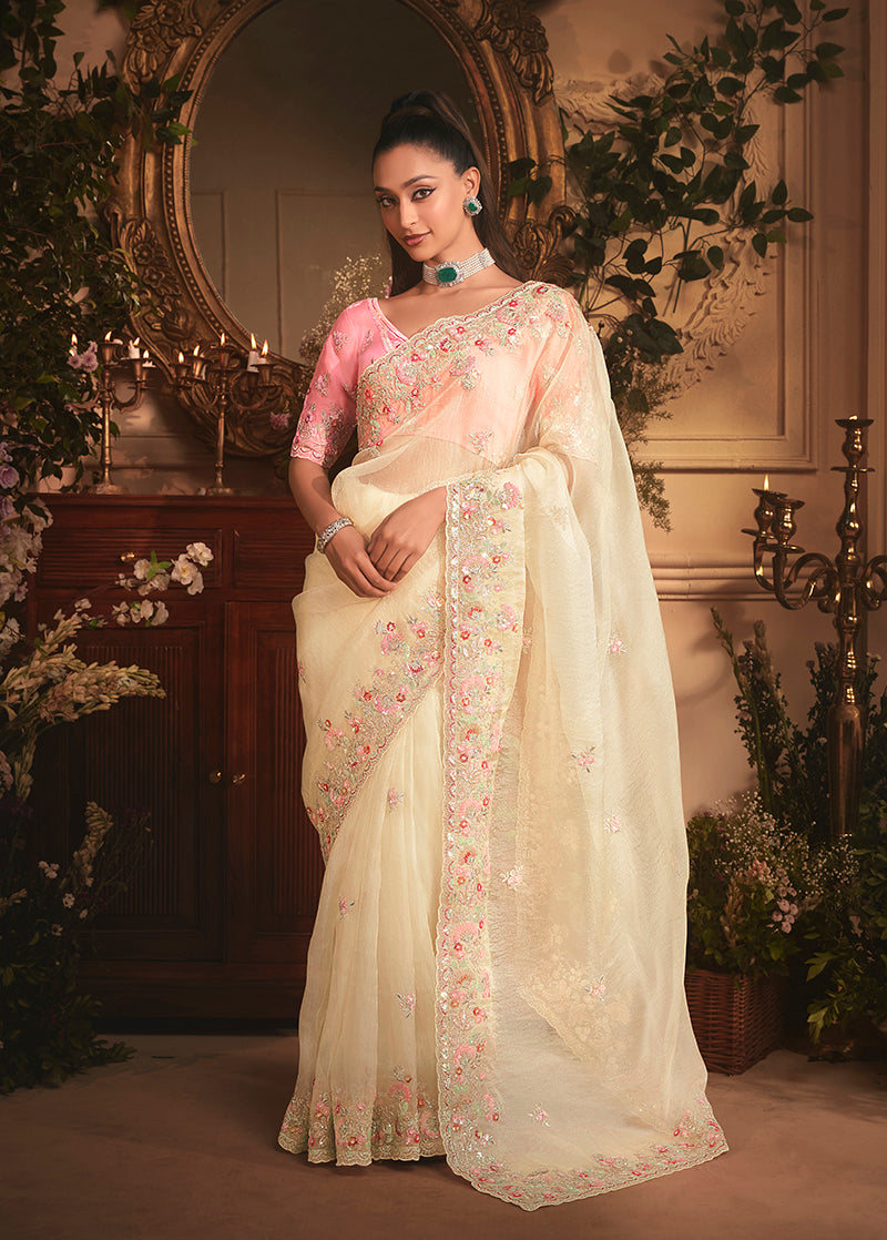 Cream Tissue Organza Saree with all-over butta work and heavy stone embellished border