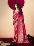 Rani pink viscose silk saree with rich zari weaving and designer tassels.