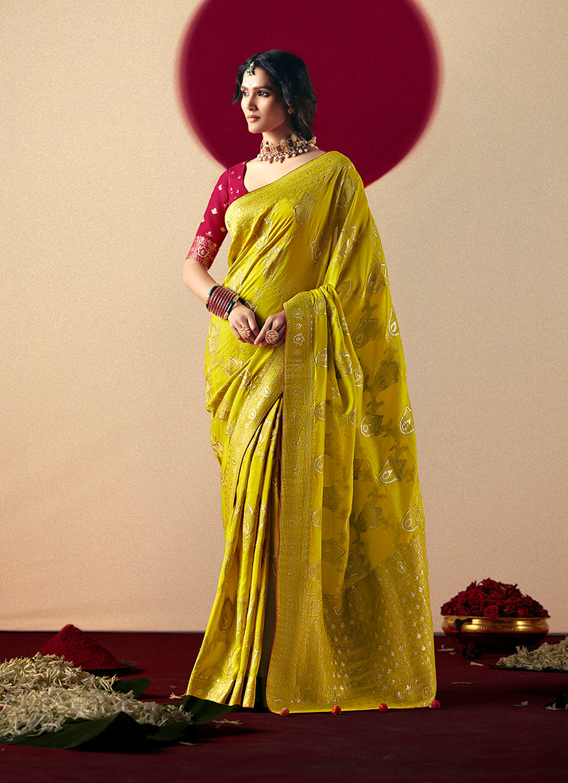 Pear-colored viscose silk saree with intricate gold zari weaving and designer tassels
