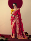 A stunning red viscose silk saree with rich gold zari weaving and elegant designer tassels.