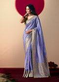 Lavender viscose silk saree with rich zari weaving and designer tassels on the pallu