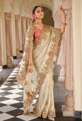 Elegant off white silk blend saree featuring beautiful Meenakari zari weaving.