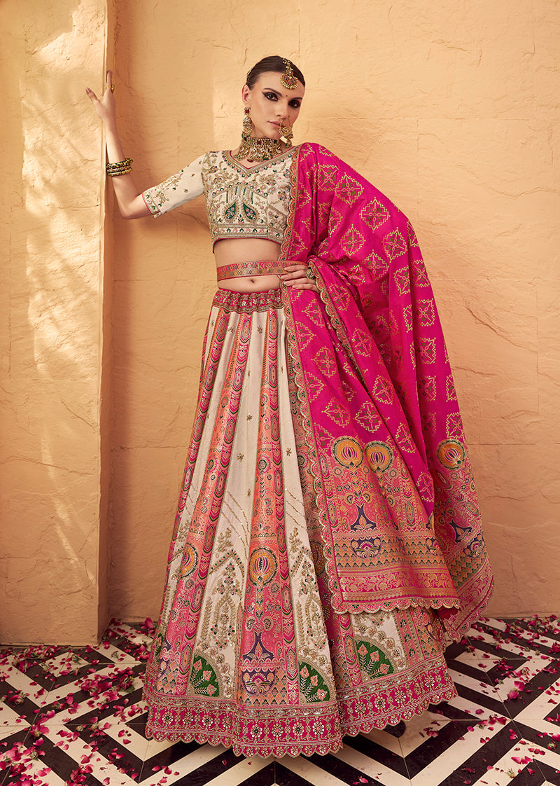 Multicolor Banarasi silk wedding lehenga with heavy gold and fuchsia embroidery