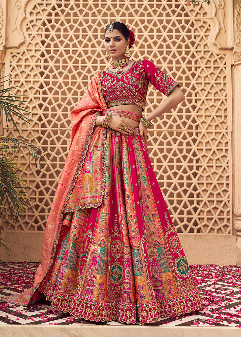 Rani Pink and Peach Banarasi silk wedding lehenga with embroidery