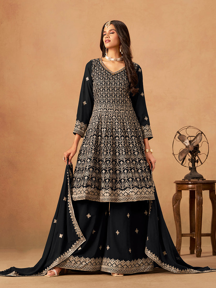 Black faux georgette salwar kameez with sequins and embroidery for festive wear