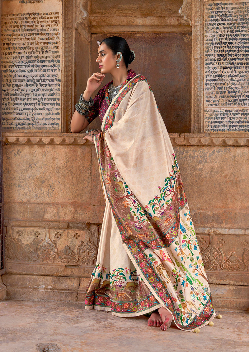 Elegant cream silk contemporary saree with ethnic printed patterns