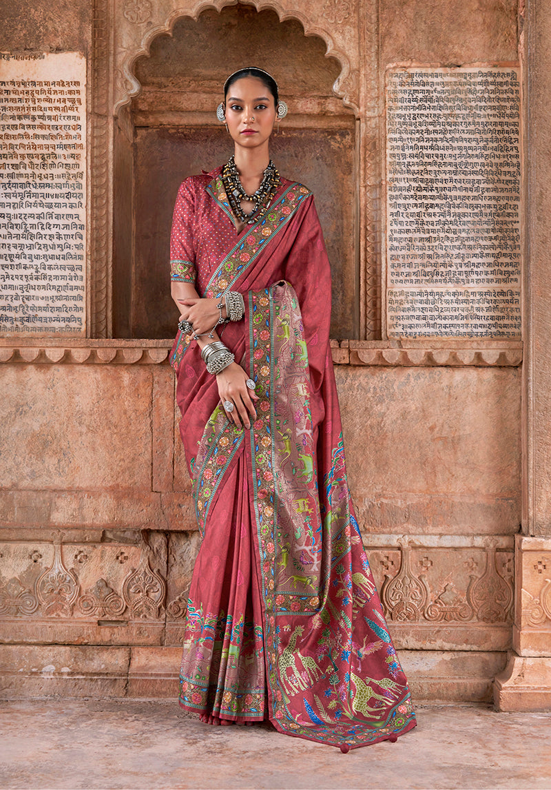 Maroon silk saree featuring intricate ethnic print