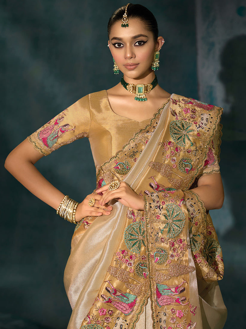 Cream Silk Blend Saree with Heavy Cutdana and Mirror Work