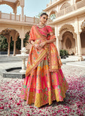 Rani Pink Banarasi Silk Wedding Lehenga with intricate zarkan and cut-dana embroidery details