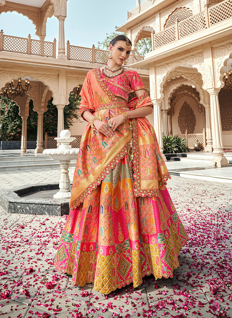 Rani Pink Banarasi Silk Wedding Lehenga with intricate zarkan and cut-dana embroidery details