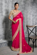 Hot pink Rangoli satin contemporary saree with intricate embroidery and lace border