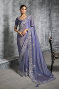 Beautiful lavender tissue traditional saree with detailed embroidery and Resham work.