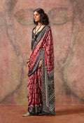 Red and black saree with Ajrakh print and Bandhej pattern in satin georgette