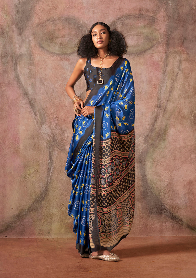 Blue and black satin georgette saree featuring Ajrakh and Bandhej patterns