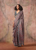 Grey Satin Georgette saree with traditional Ajrakh print and Bandhej design.