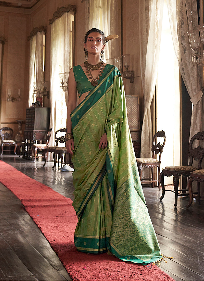 Parrot Green Tussar Silk saree with detailed traditional weaving and matching blouse