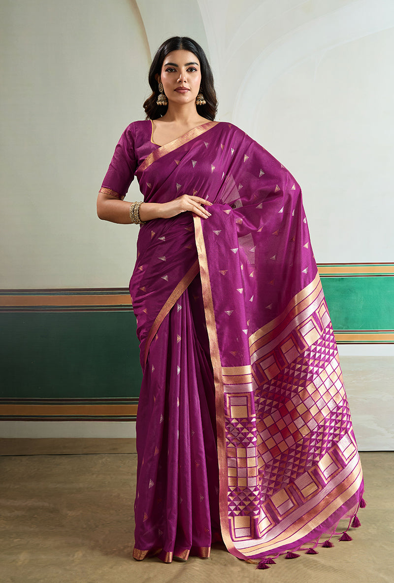 A luxurious purple handloom silk saree with detailed weaving, ideal for festivals.