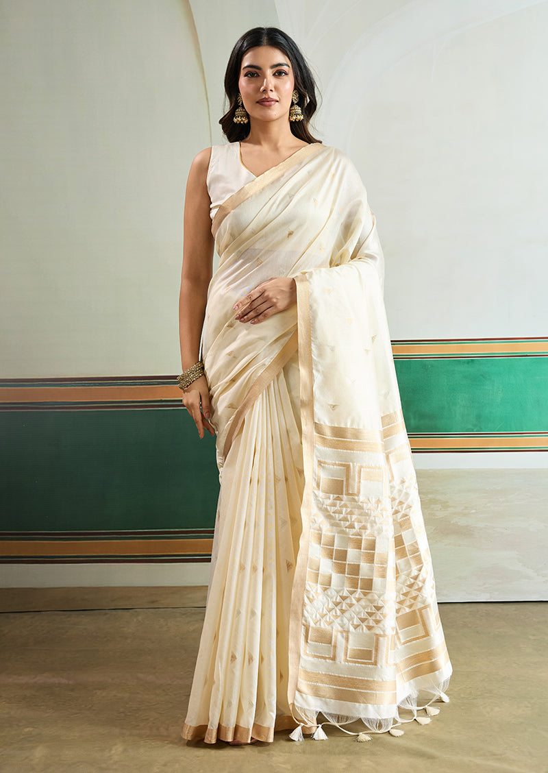 Off White handloom silk saree with intricate weaving patterns for festival wear