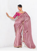 Pink fancy fabric designer saree with delicate embroidery for festive occasions