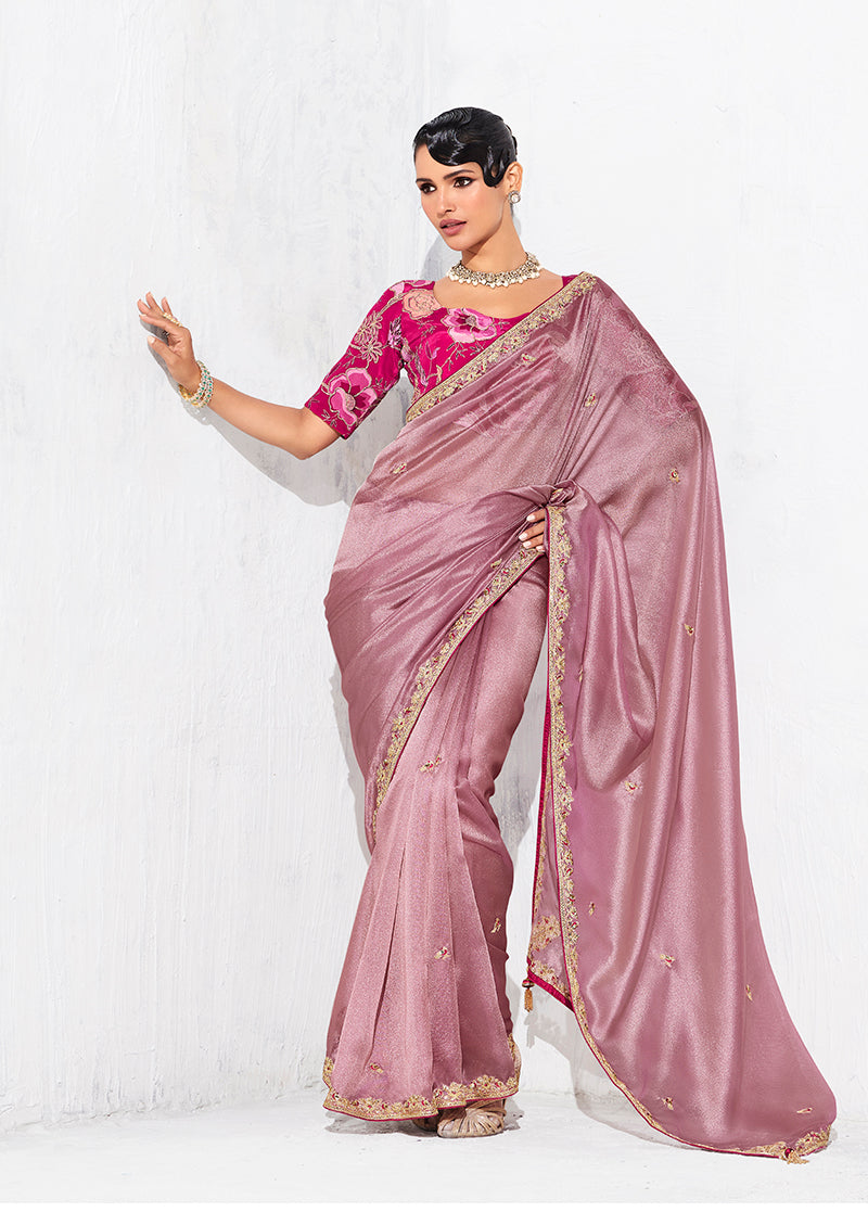 Pink fancy fabric designer saree with delicate embroidery for festive occasions