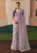 Lilac designer party wear saree with intricate embroidery, sequins, and zari detailing
