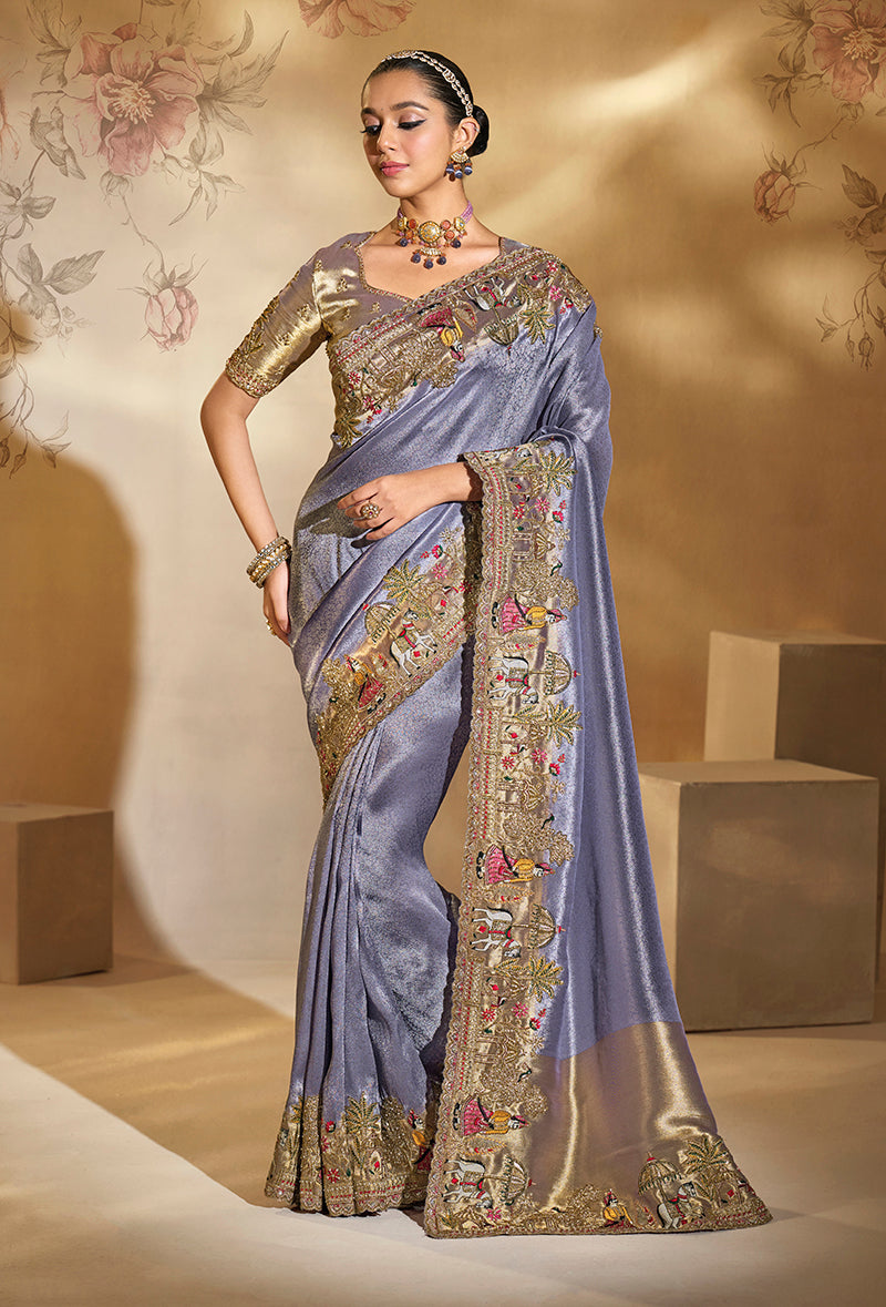Lavender silk blend saree with intricate Cut Dana and Moti embroidery.