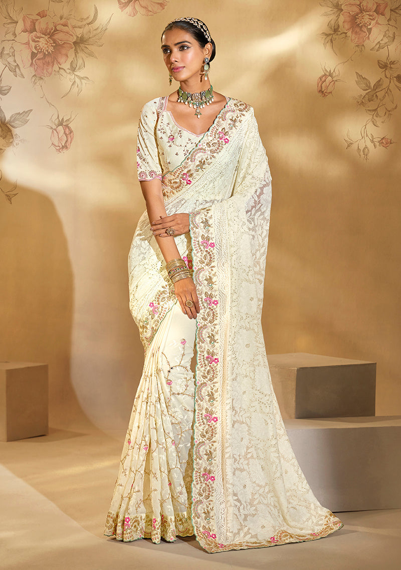 Off white georgette saree with pearl and cut dana embroidery