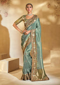 Sea green silk blend saree with heavy Cut Dana and Moti embroidery work.