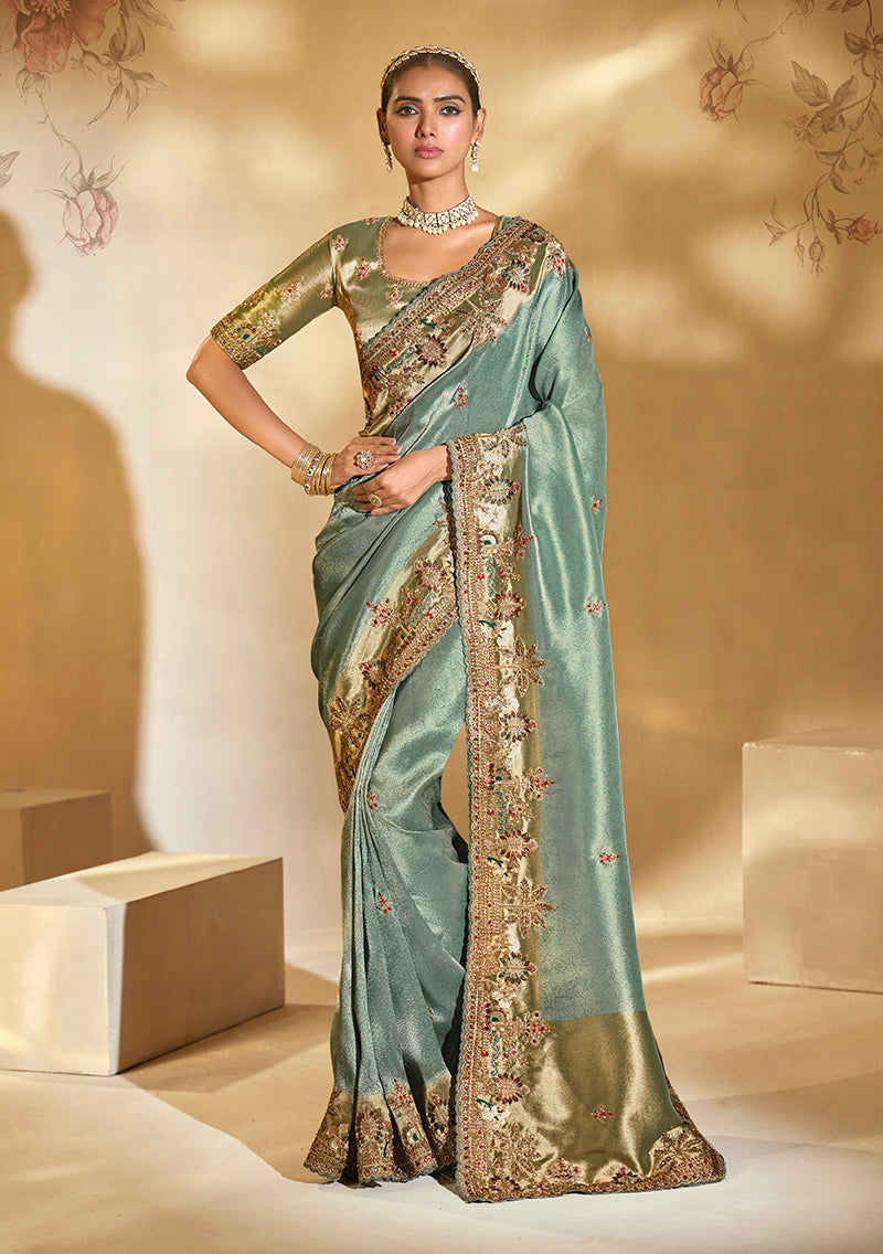 Sea green silk blend saree with heavy Cut Dana and Moti embroidery work.