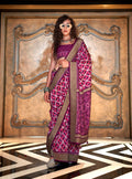 Magenta silk blend saree with double Ikkat-style foil print pattern.