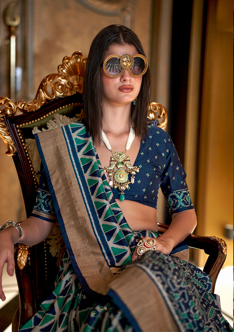Monjolika Fashion Teal Double Ikkat Silk Blend Foil Printed Saree