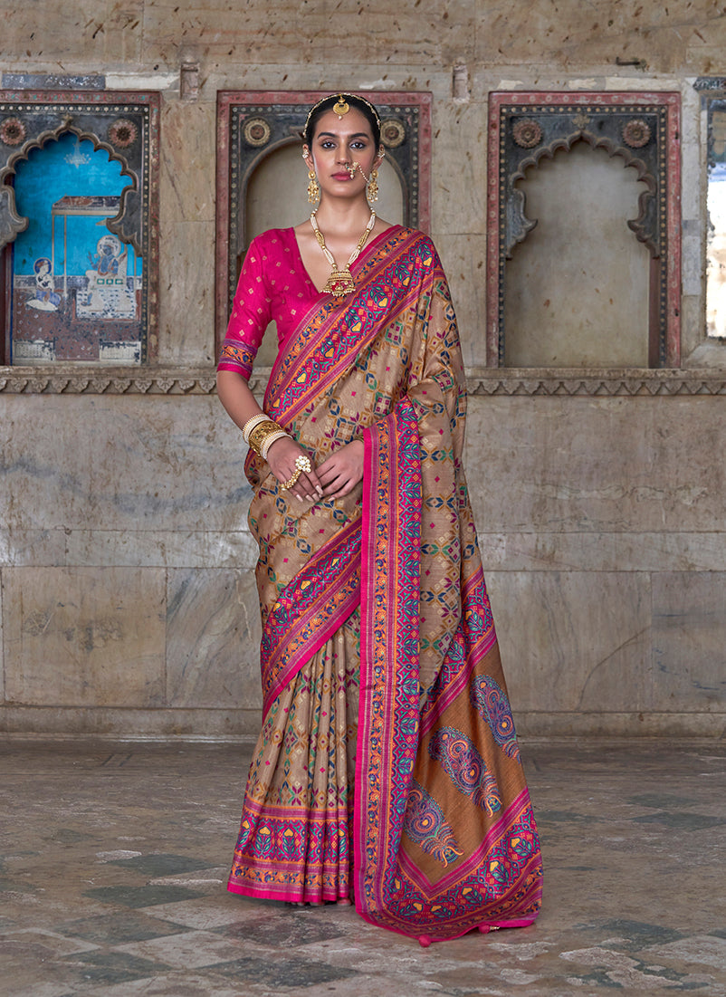 Beige and rani pink silk blend saree with traditional Patola print