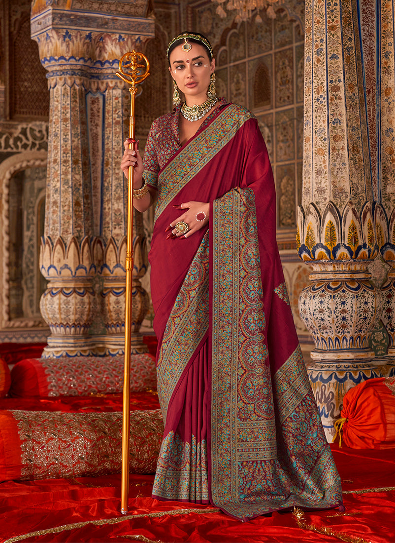 Deep maroon silk blend traditional saree featuring elegant print work