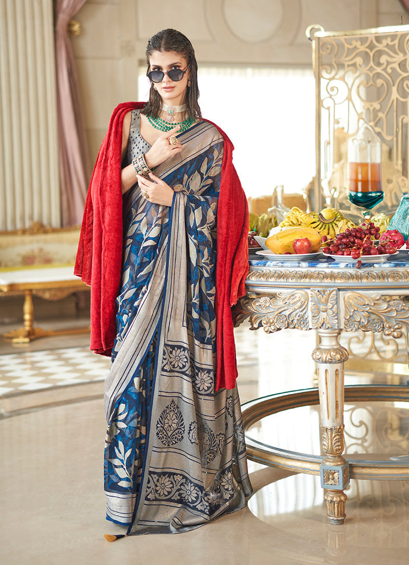 Navy blue georgette saree with fancy embroidery for formal events.