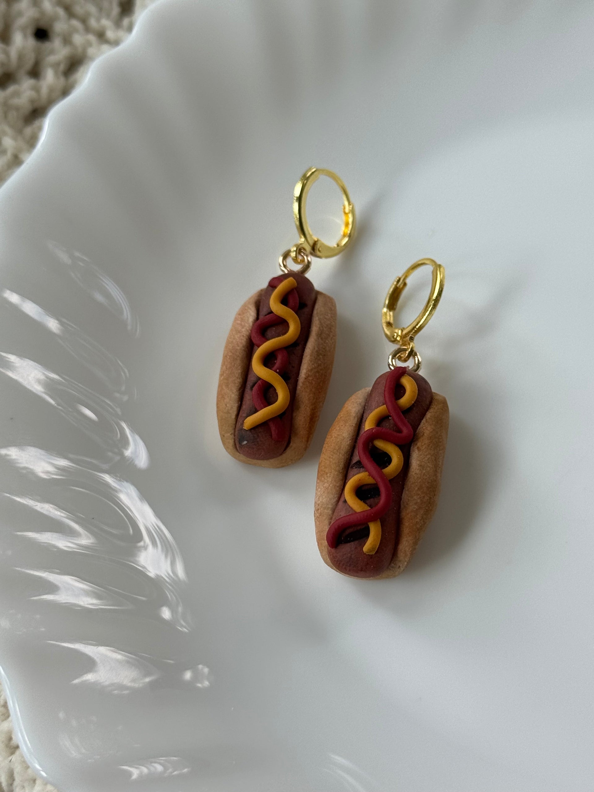Quirky Hotdog Huggies made from polymer clay with 14k gold-plated hooks.