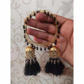Gold-tone bangles with black silk threads, pearls, and dangling jhumka charms