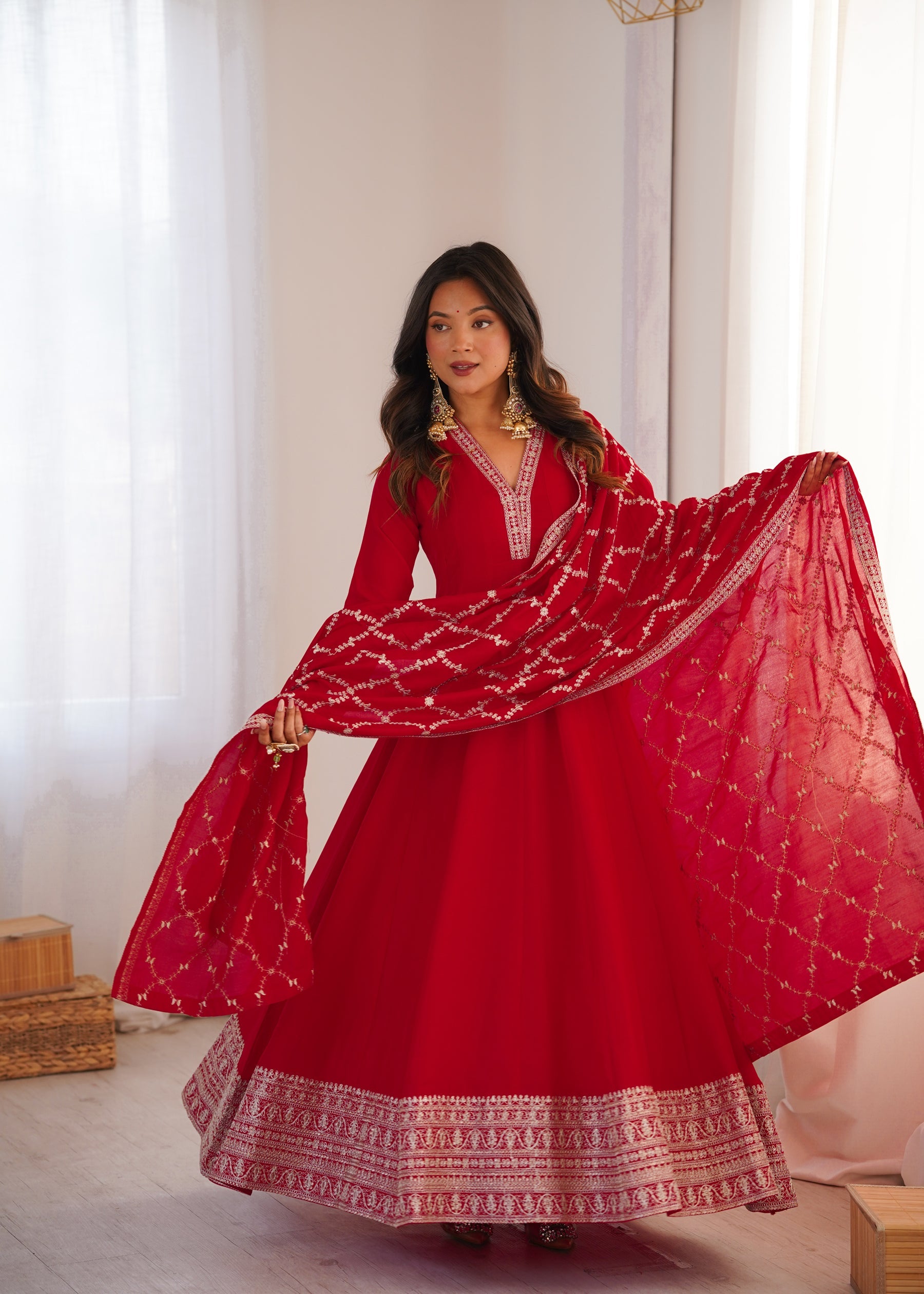 Red Vichitra Silk Anarkali Gown featuring intricate jari and sequence embroidery with full flair and matching dupatta.