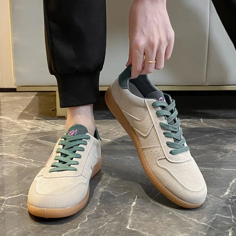 Minimalist unisex lace-up sneakers in mesh and PU material
