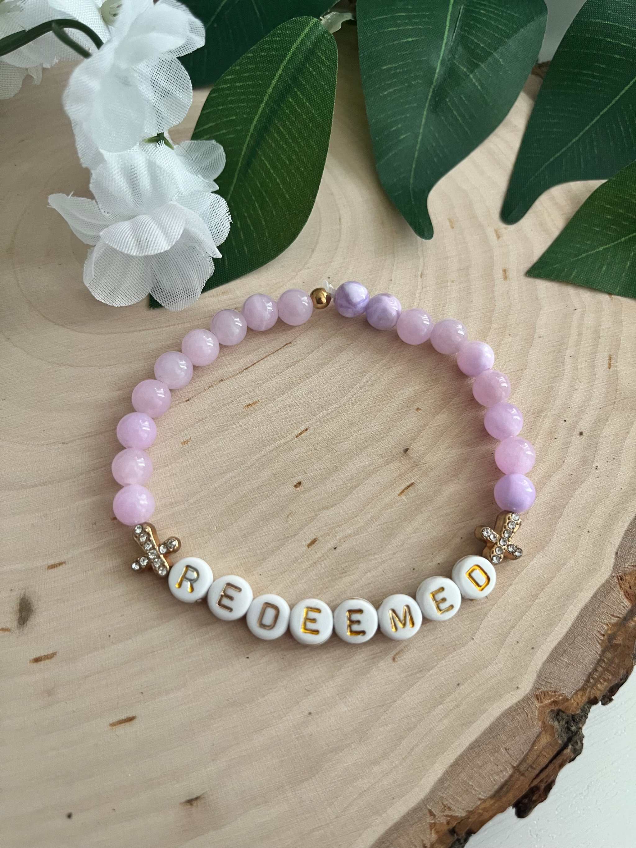 Redeemed Lavender Bead Bracelet featuring elegant lavender glass stones on a white background.
