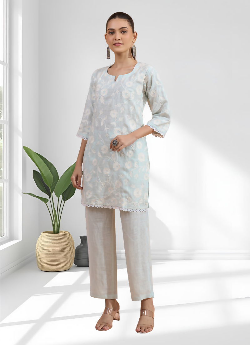 Sky blue linen cord set with detailed embroidery and round neck design
