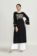 A stylish black rayon tunic with intricate embroidery detailing, displayed against a neutral background.