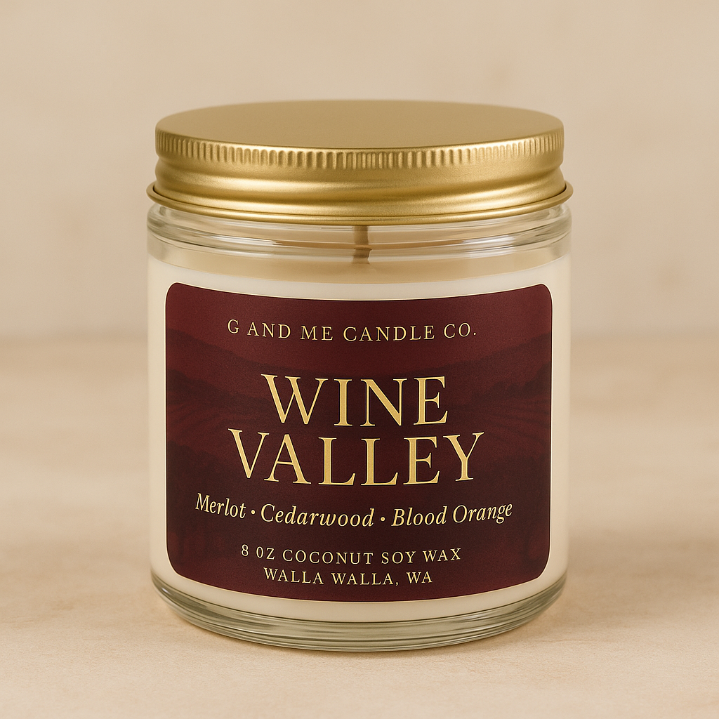 Wine Valley scented candle in a glass jar with gold lid and deep red label