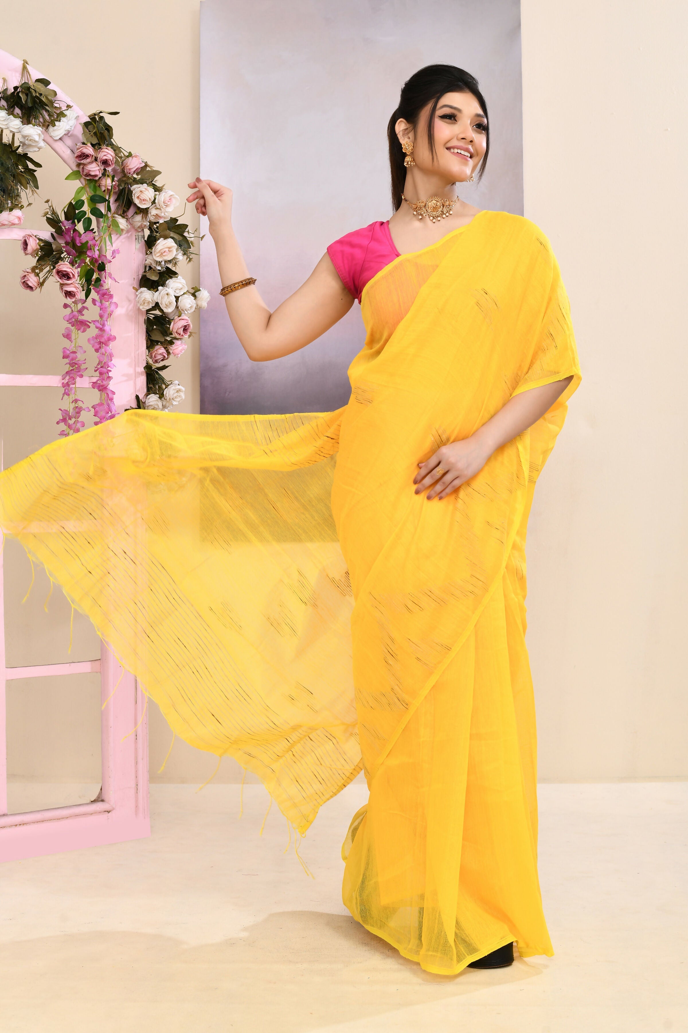 Yellow embellished Jamdani saree with detailed weave pattern
