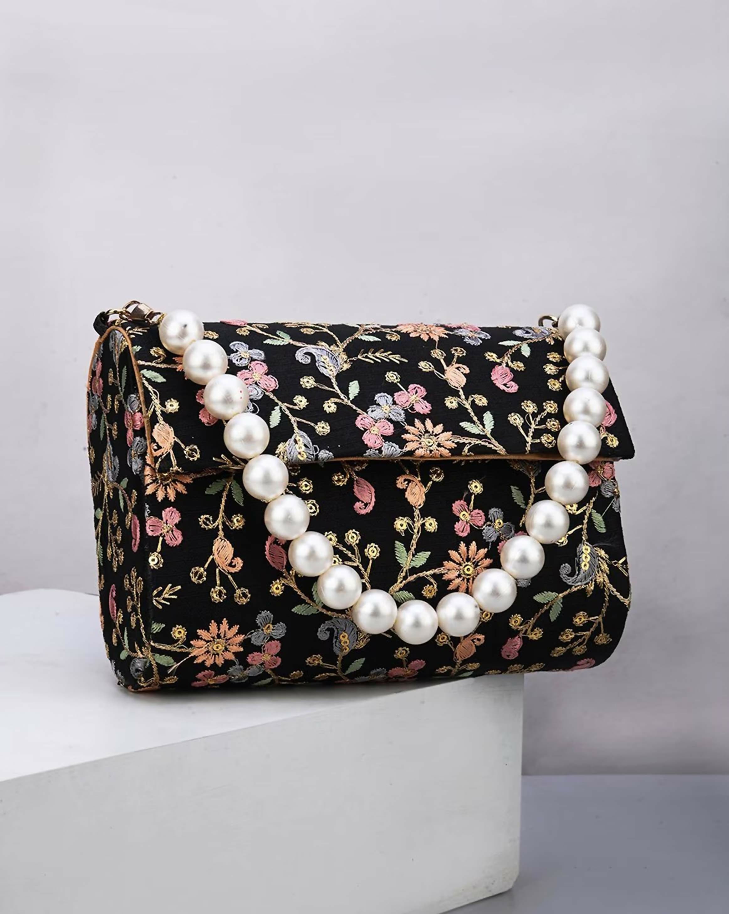 Black Joban Fashion embellished potli clutch with intricate detailing for evening wear